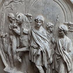 Close up details of the roundel showing Hadrian and his party, including Antinous.
