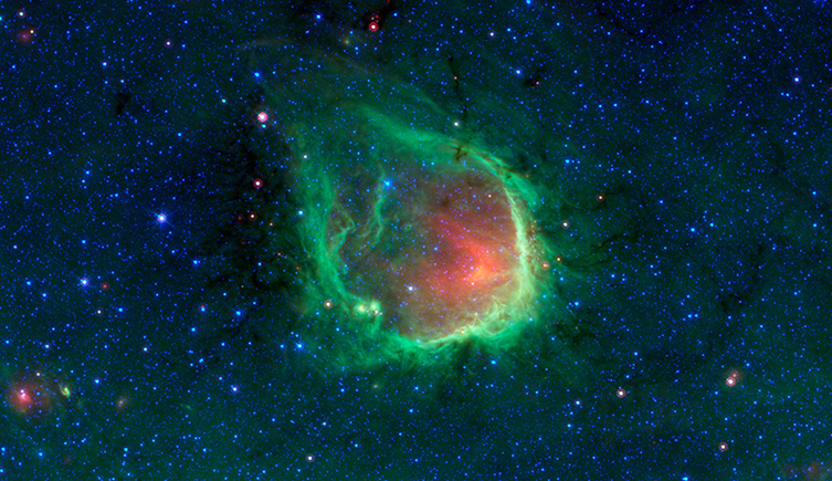 A glowing red and green ring of gas and dust among hundreds of bright blue stars