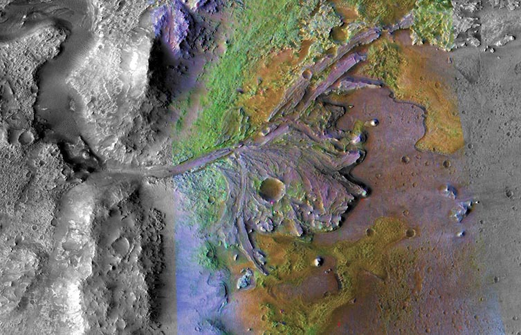 A satillite image of the Jezero Crater, showing the lines of an old river carved into the rock leading to what was once the river delta.
