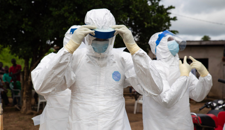 Humans in protective clothing during an Ebola virus outbreak