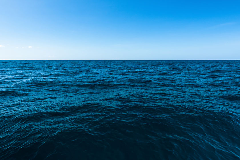 A view looking across the ocean, with nothing but water and sky. 
