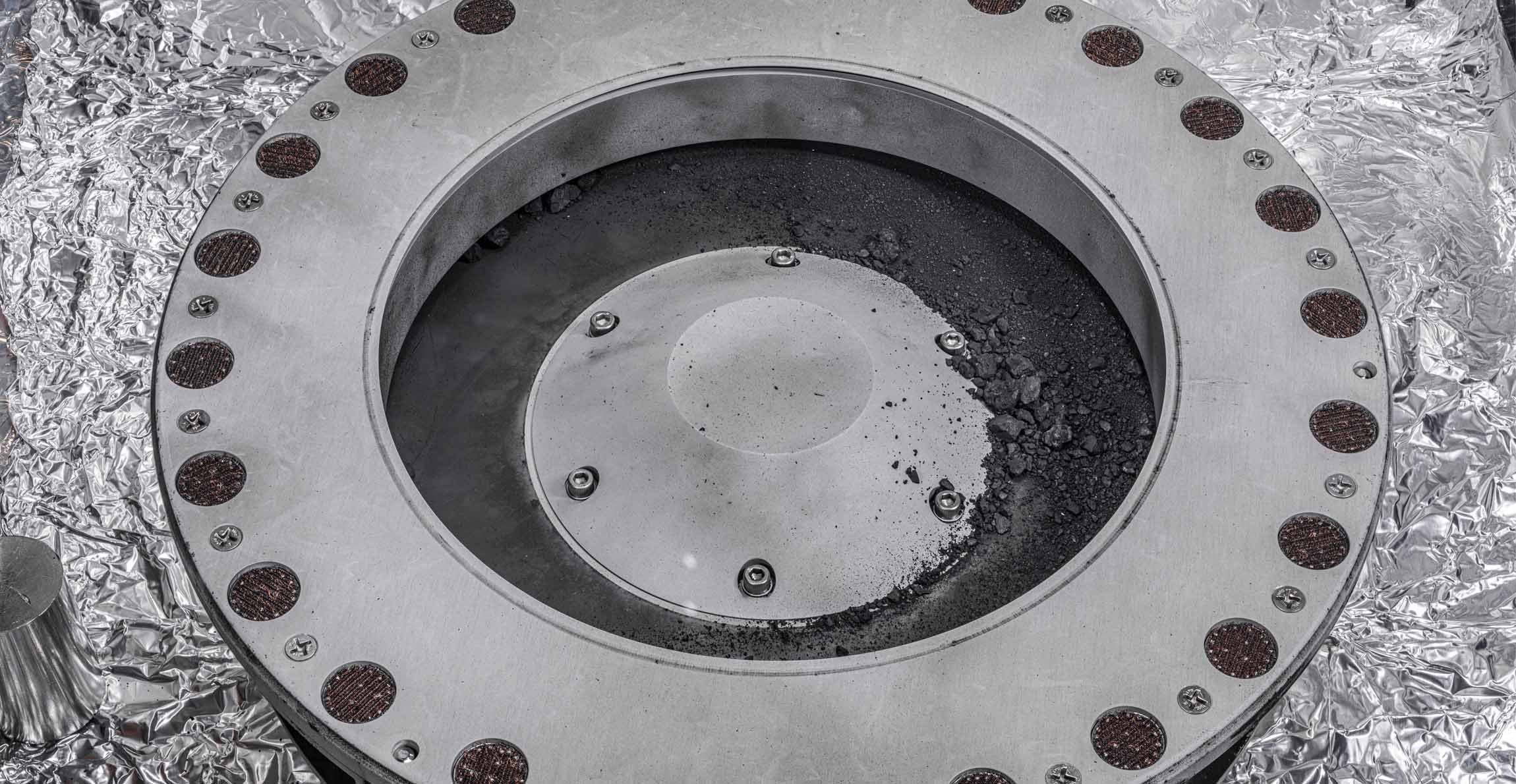 Samples of the meteorite in the capsule that they were contained in when they were flown to Earth