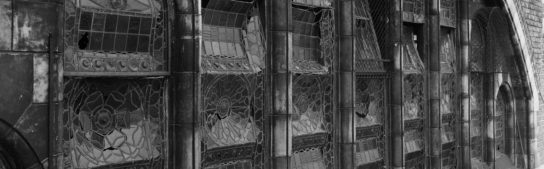 photograph of WW2 bomb damage to stained glass windows at the Museum
