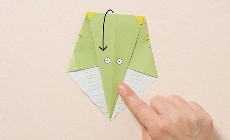 Step three - folding the top point down so that it looks like a pentagon