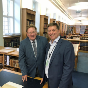 Prof Mickey Adolphson shows medieval Japanese manuscript at Cambridge