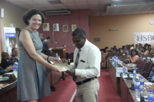 Laura Davies awarding certificates to participants of the British Council teacher training course.