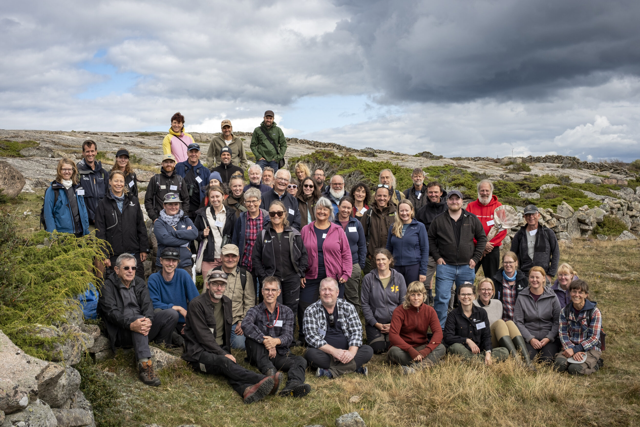 ©MartinMolholm A group of people gathered on heathland in Sweden