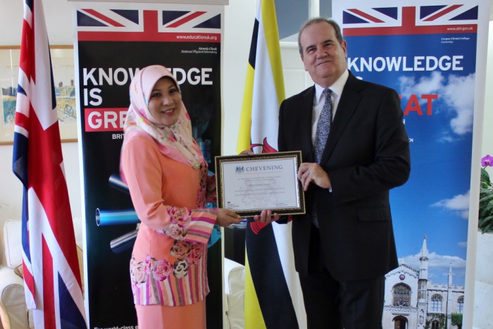Presenting Dinah with a certificate