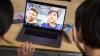 Two pupils in an online call with overseas pupils