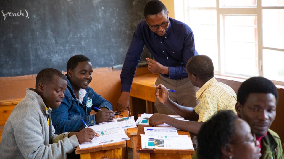 Teachers discussing in small groups