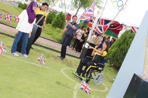 Brunei's first female Olympian, Maziah Mahusin, attempts our Wheel-chair Shot Put Challenge.
