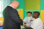 Ambassador Greg speaking with Noma victim