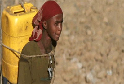 Girl in Amhara region of Ethiopia carrying water