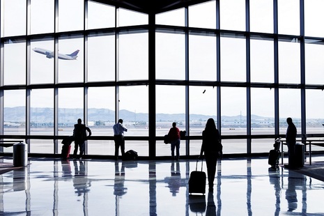 Stock image of an airport lounge.