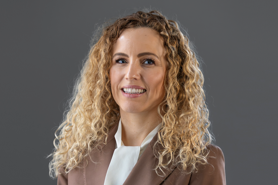 Katie White OBE MP