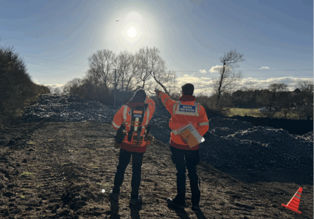 Fire and Rescue officers fly a drone at the Kidlington illegal waste site.