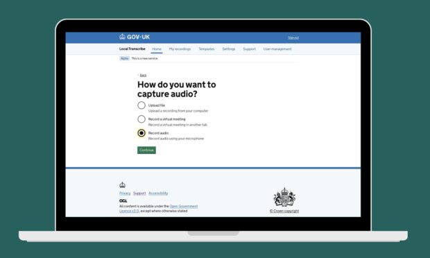 A screenshot of the Local Transcribe tool on a laptop