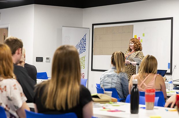 A person presenting their ideas at the unconference.