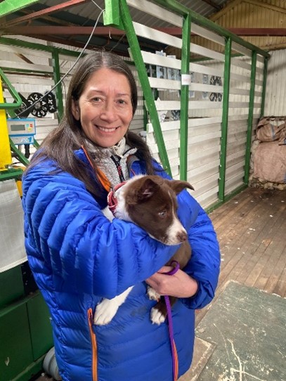 woman holding a dog