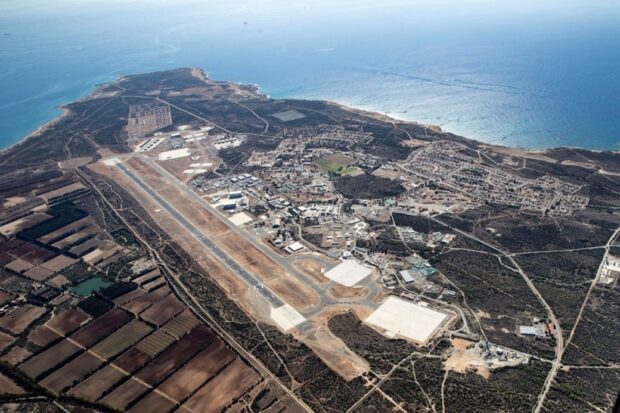 a runway surrounded by sea