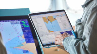 Image of laptop and ECDIS screen