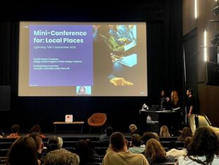 The team presenting at the conference.