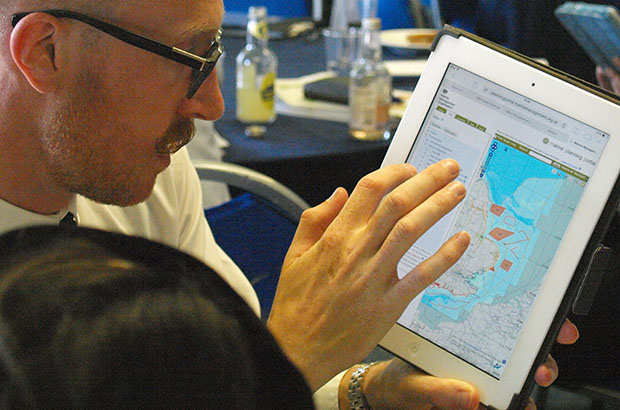 Marine planner shows stakeholder an online planning tool