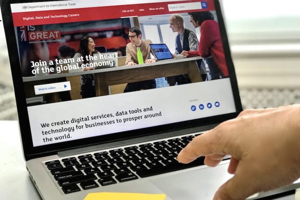 laptop with screen that reads join a team at the heart of the global economy