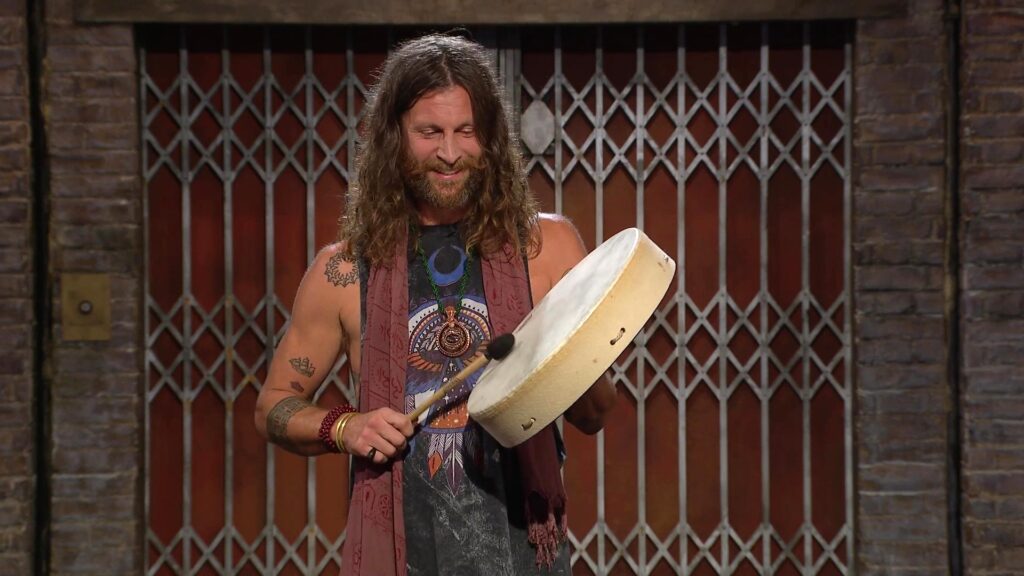 Liam plays the drums to the dragons, in a short example of a Full Power Cacao ceremony.