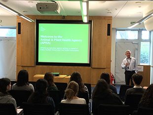 Professor Ian Brown, Head of Virology, presenting to the students