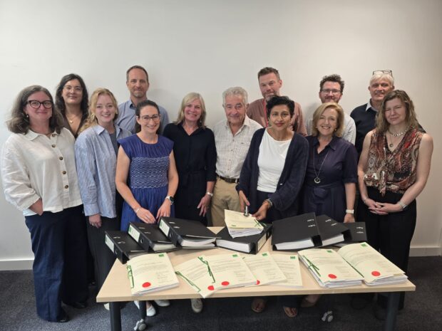 Marian Spain, Tony Juniper and Navroza Ladha with the Surrey Hills and Yorkshire Wolds project teams and the official signed and sealed designation Orders.