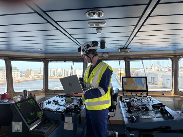 Rob Taylor working onboard a vessel