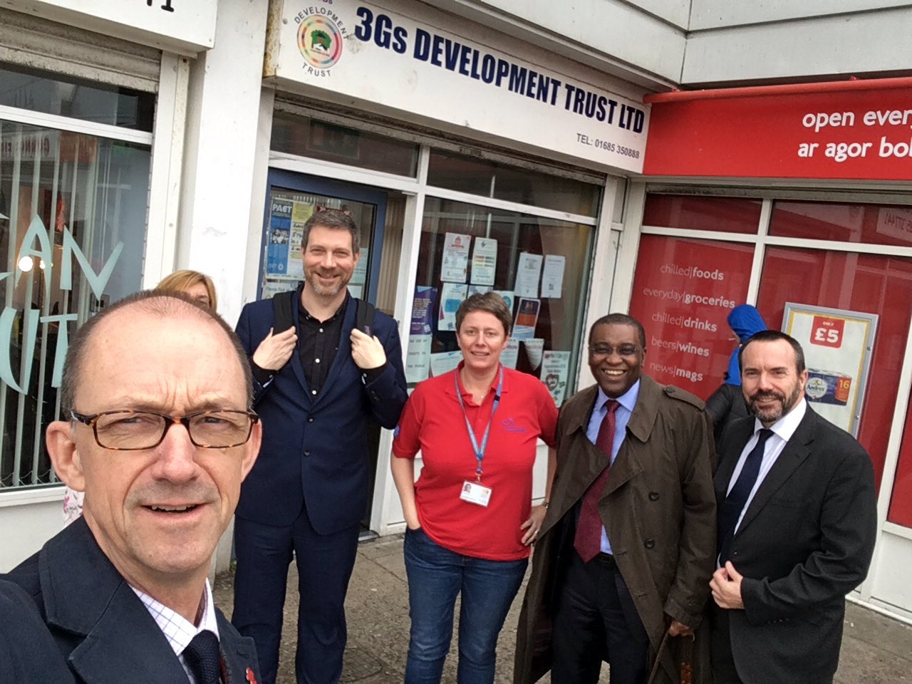 Phil Jones, member of the Social Security Advisory Committee, with Committee colleagues Chris Goulden and Seyi Obakin with stakeholders during a visit.