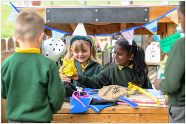 Two children playing in a classroom
