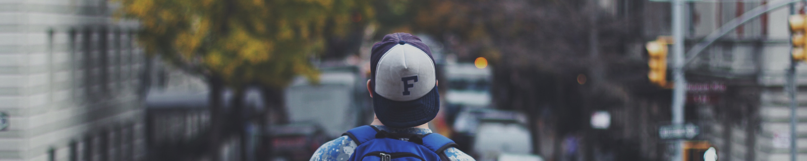 teenager looking out at a city