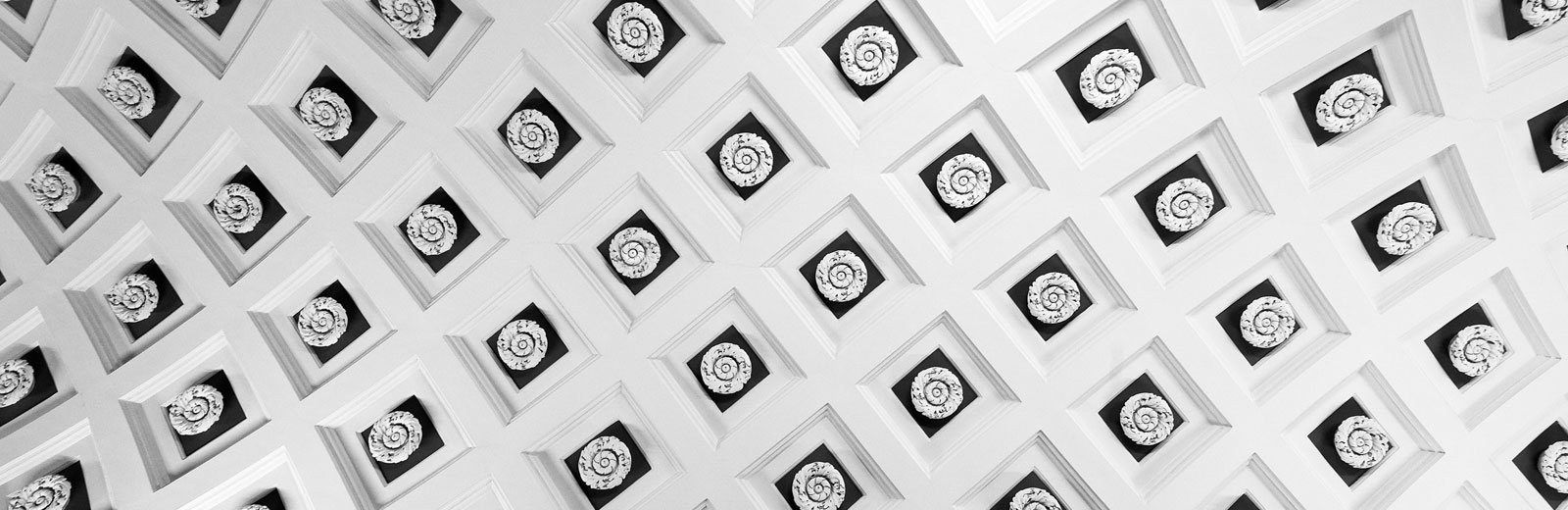 White wall with squares around