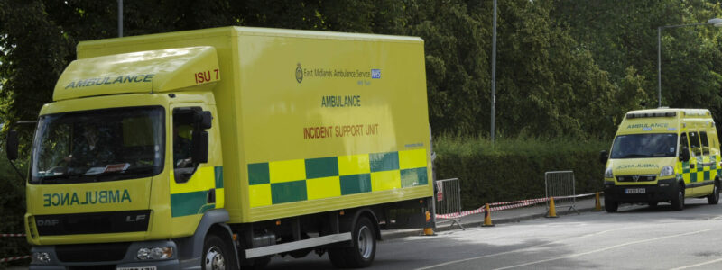 Incident support ambulances attend a scene.